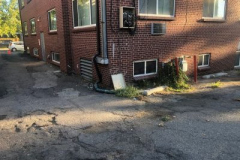 highland-apartments-parking-lot-damaged-asphalt-400x300-1